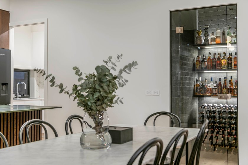 Ainslie custom home kitchen and living area by Entice Homes