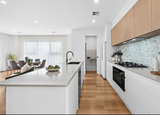 Kitchen and living area in South Jerra Tralee home by Entice Homes